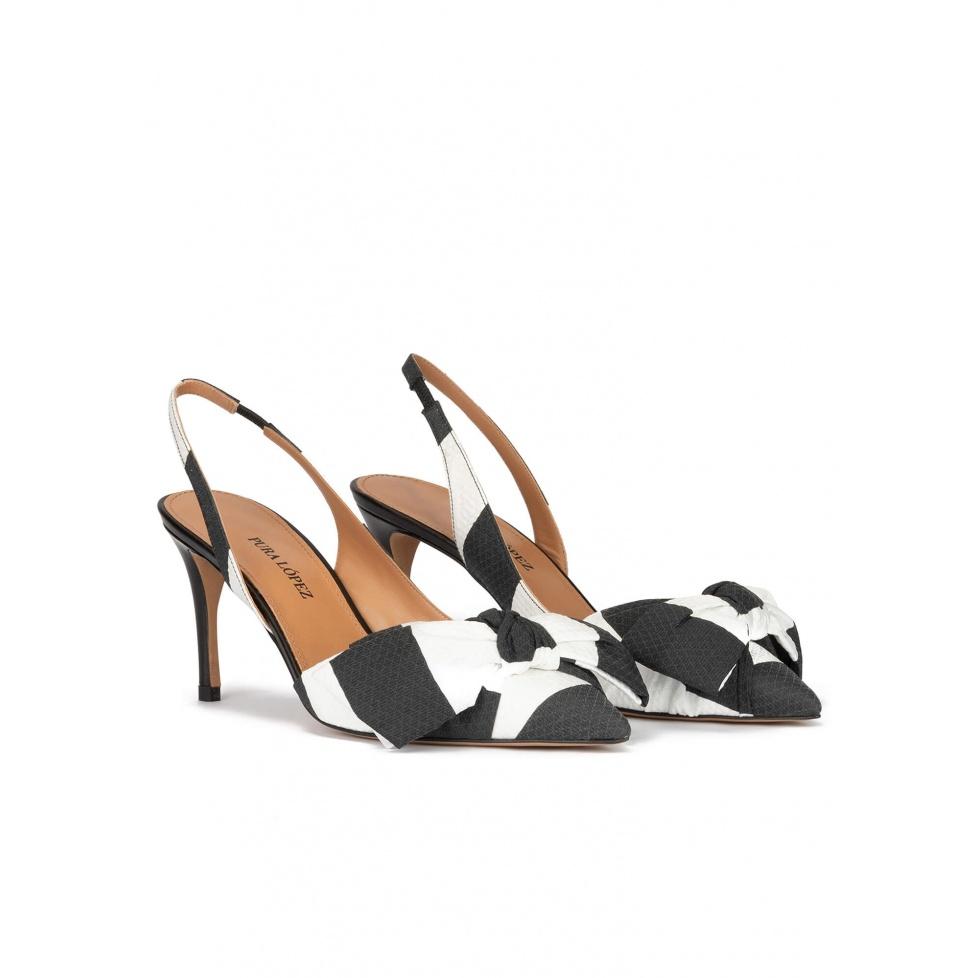 pura lópez Zapatos de punta fina y tacón medio en blanco y negro con lazo Precios de Black Friday