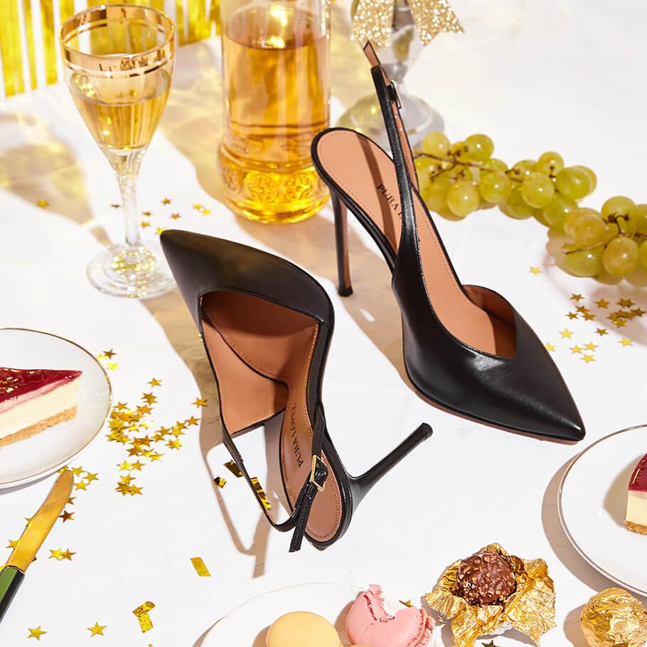 pura lópez Slingbacks de tacón alto con escote asimétrico en piel color negro Gran oferta