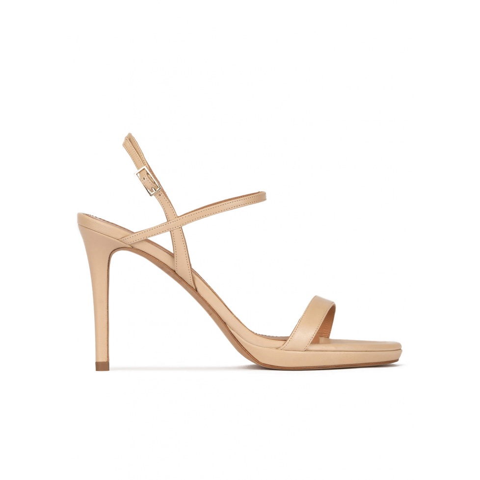 pura lópez Sandalias de plataforma y tacón alto en piel beige