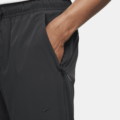 Nike Nike UnlimitedPantalón versátil con bajos con cremallera Dri-FIT ADV - Hombre Solo hoy