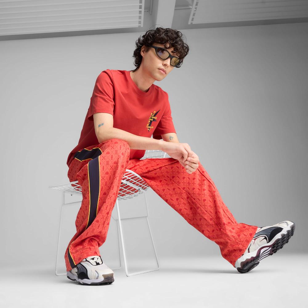 Puma Pantalones de chándal holgados y estampados Road To Unity para hombre Solo hoy