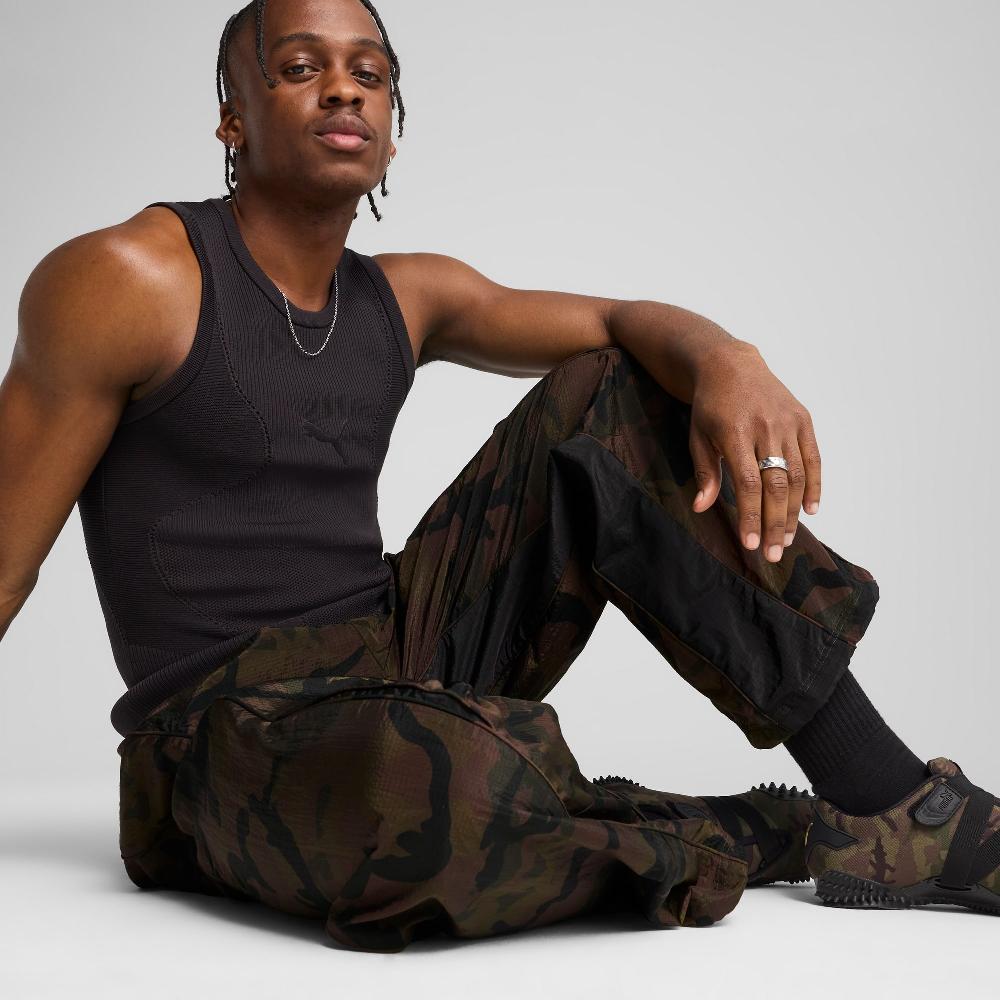 Puma Pantalones ripstop con estampado integral Mostroverse CLRT unisex Devoluciones gratuitas