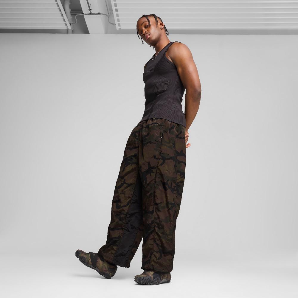 Puma Pantalones ripstop con estampado integral Mostroverse CLRT unisex Devoluciones gratuitas